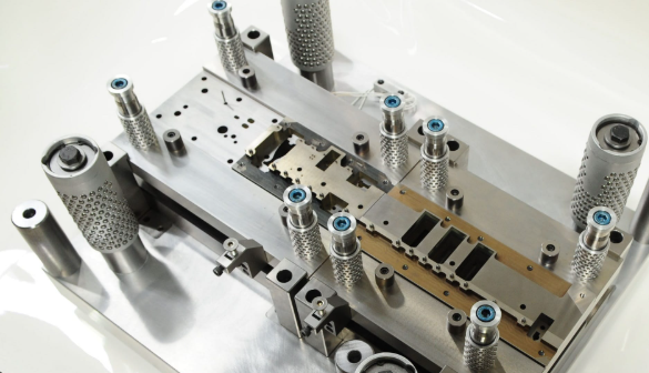 metal stamping press transforming flat sheet steel into precision automotive components
