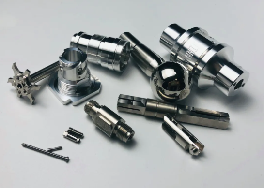 selection of common cnc machining materials including metals and engineering plastics