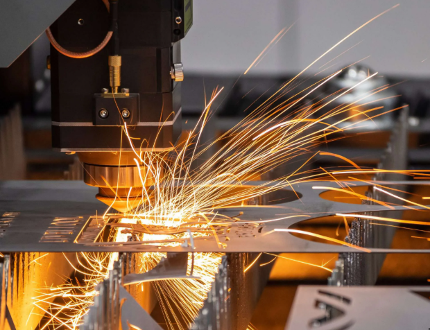 professional laser cutting machine precisely cutting sheet metal in a modern manufacturing facility