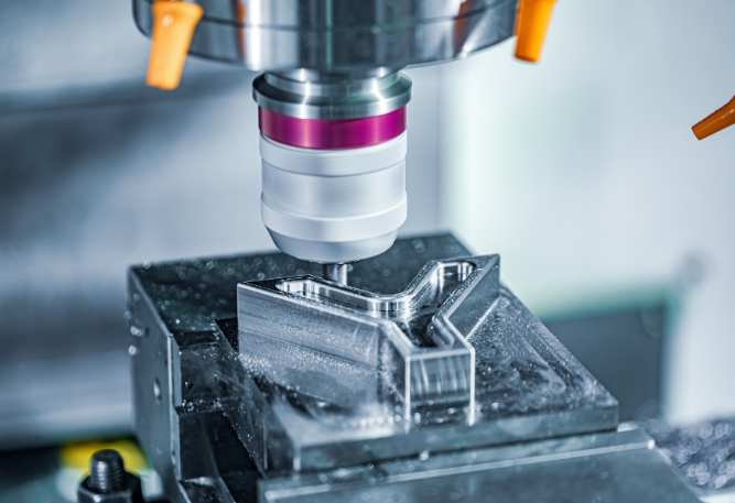 cnc machine precision cutting aluminum with coolant and metal chips in industrial setting