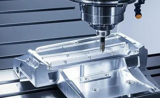 5 axis cnc milling machine performing precision cutting operations on metal