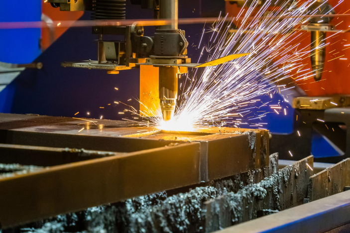 advanced cnc laser cutting system performing precision sheet metal fabrication in a modern manufacturing facility