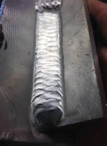 inspecting an aluminum tig bead after welding