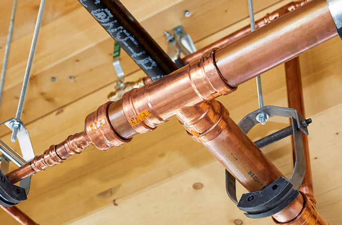 soldering copper tubing at a safe well prepared workbench