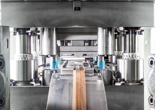 cross section view of stamping die components working in coordination