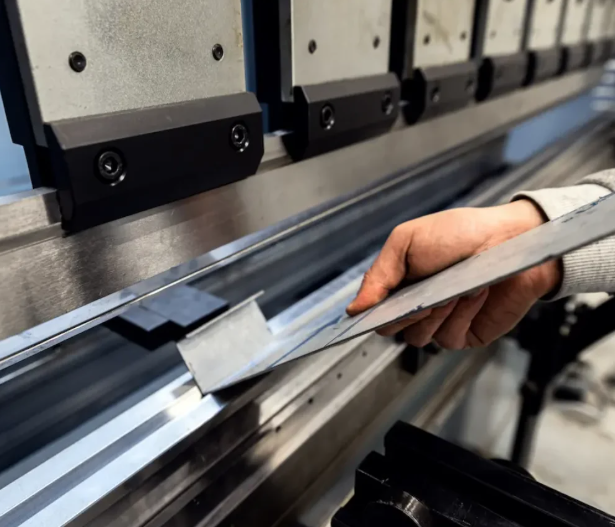 cnc press brake performing precision bending operations on sheet metal