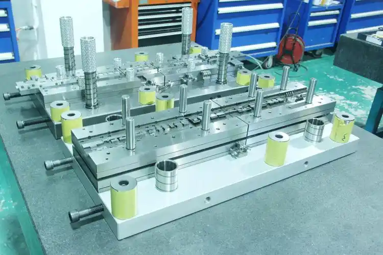 precision manufacturing die assembly showcasing the specialized tooling that enables mass production of identical metal components