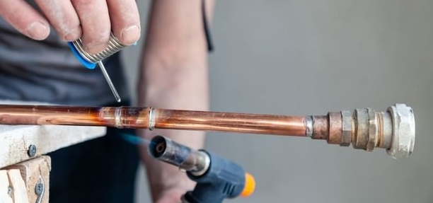 safe workspace setup for soldering copper pipe