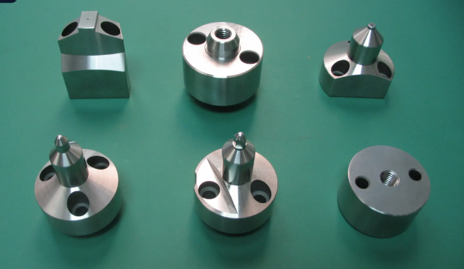 laser cut aluminum components for automotive electronics and architectural applications