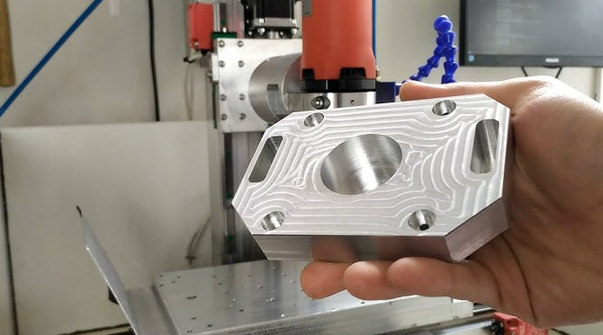 cnc machine precision cutting aluminum stock into custom components