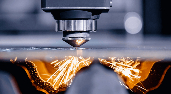 fiber laser cutting stainless steel with precision in a modern fabrication facility