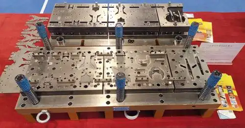 exploded view of a complete tool assembly revealing the precision components that work together during stamping operations