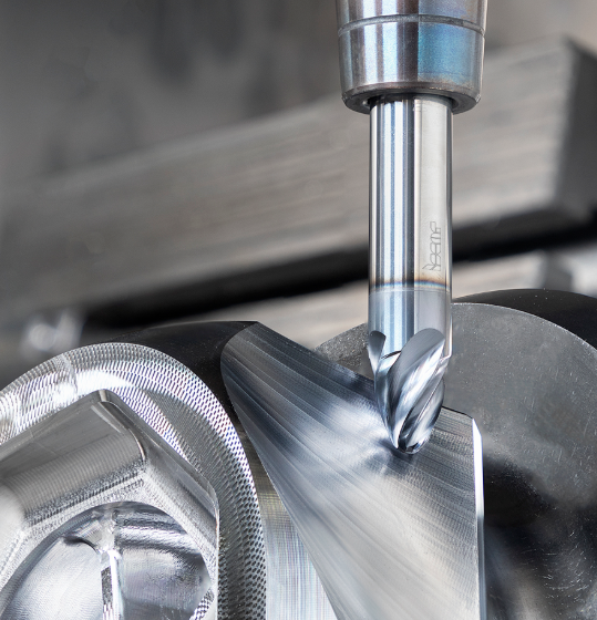 cnc milling uses rotating tools on stationary parts while turning spins the workpiece against fixed cutters