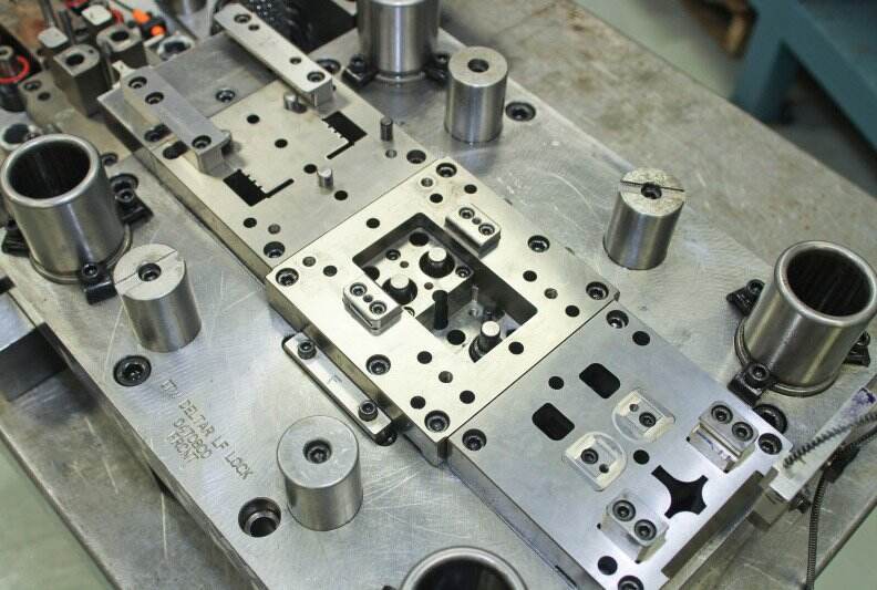 precision die manufacturing facility with advanced cnc machinery and metal stamping equipment