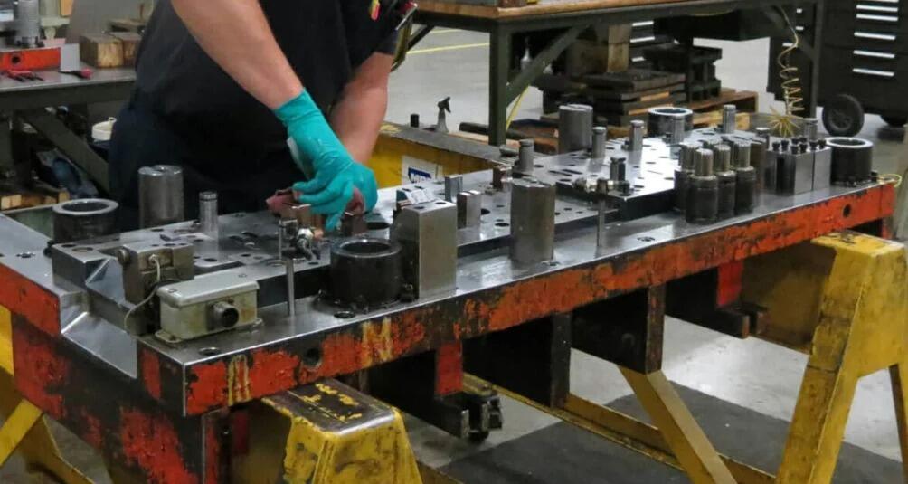 die maintenance inspection identifying wear patterns for proactive repair