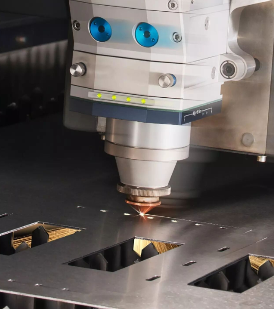 aluminum parts progress through deburring and finishing stages after laser cutting