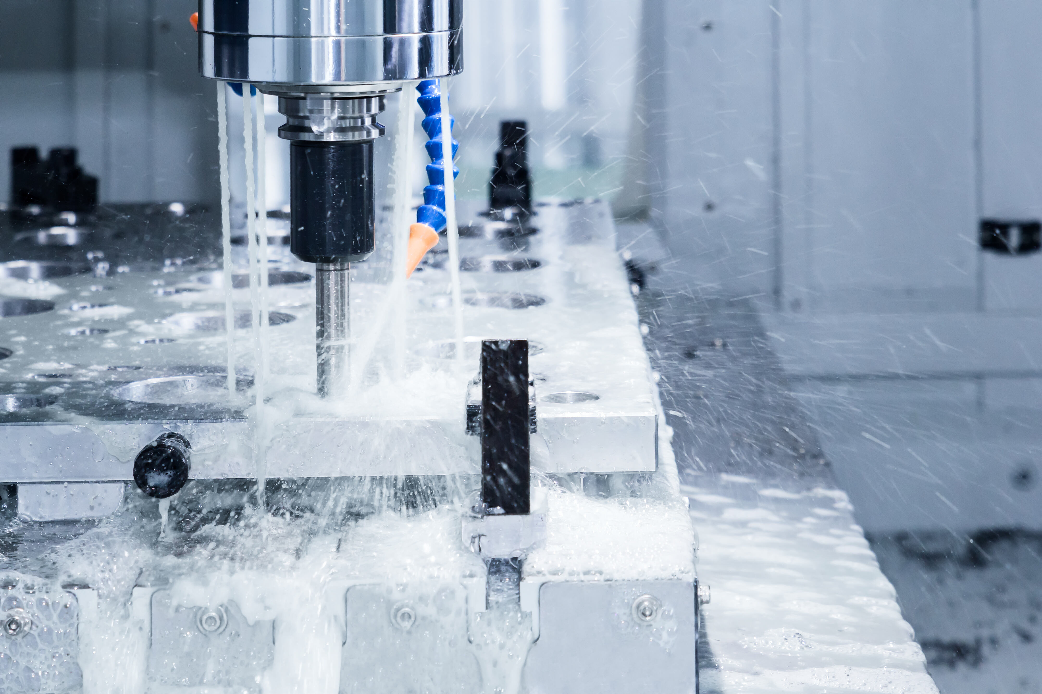 cnc milling machine precision cutting metal components in modern manufacturing facility