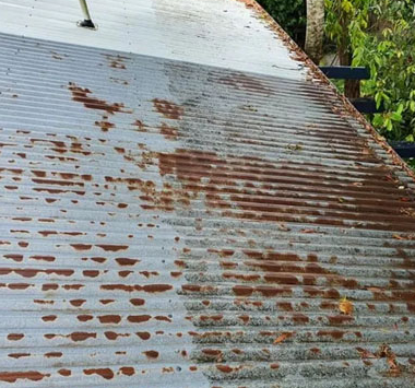 checking metal siding for chalk rust and coating issues