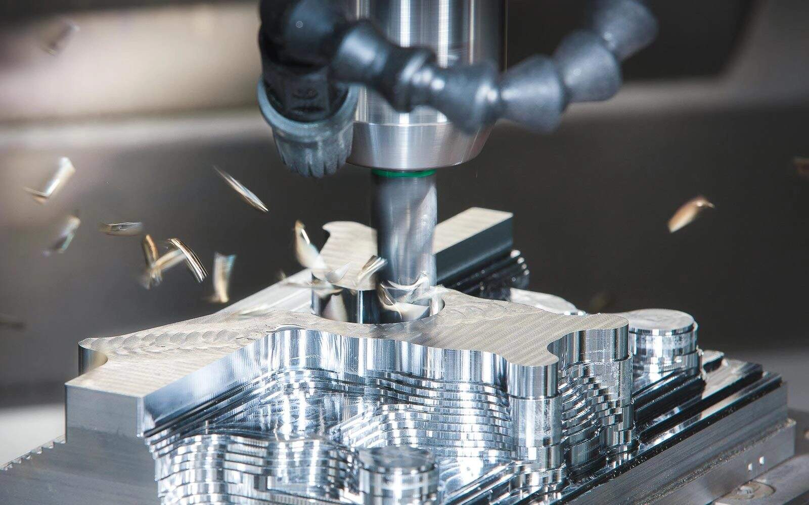 cnc machining compared to additive manufacturing for precision component production