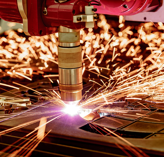 fiber laser cutting thin metal sheet with precision sparks in industrial setting