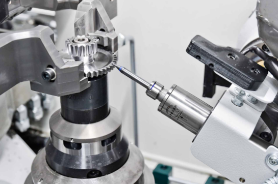 cnc turning center machining a precision cylindrical shaft component