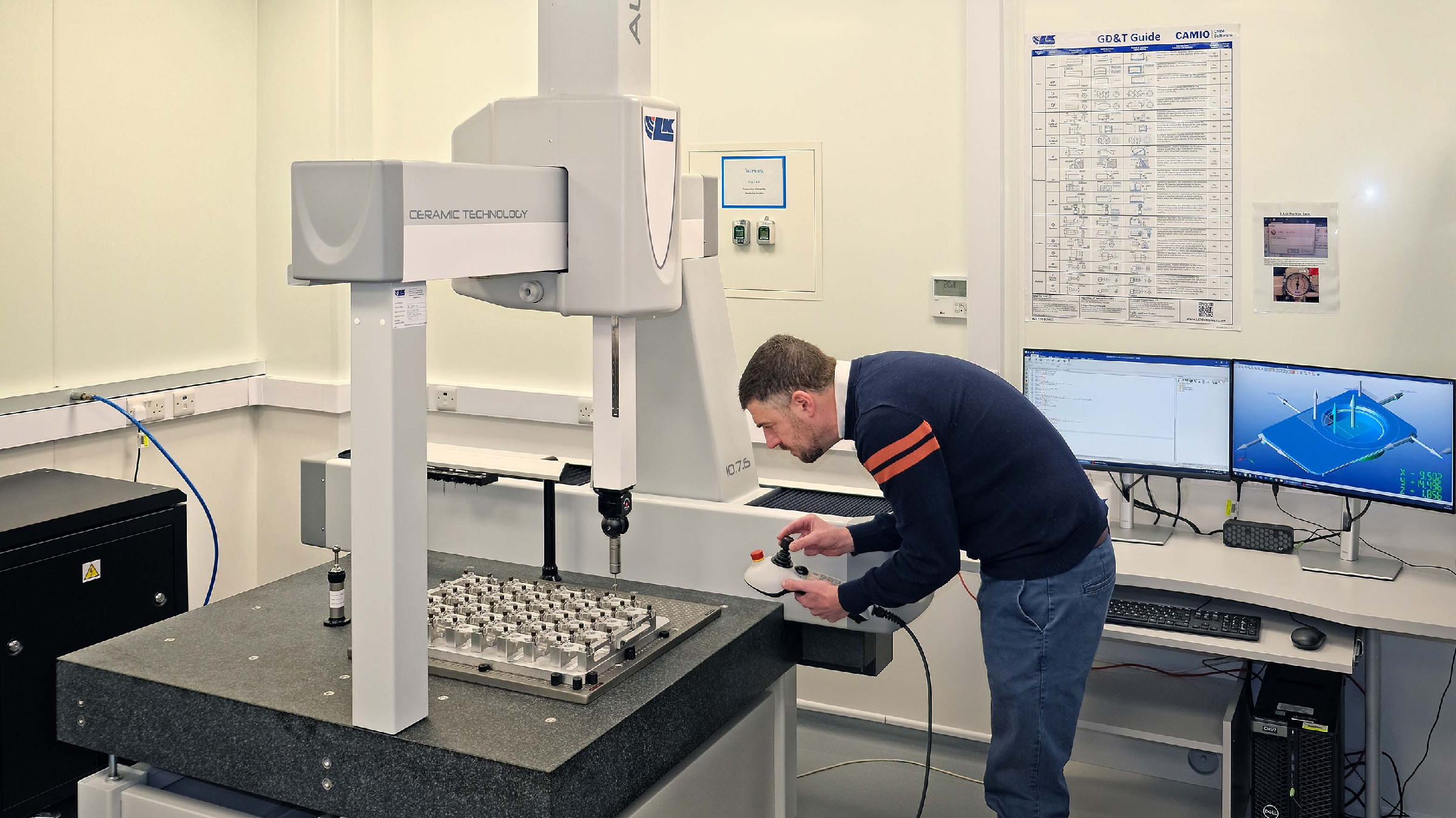 quality control technician conducting cmm inspection in certified facility