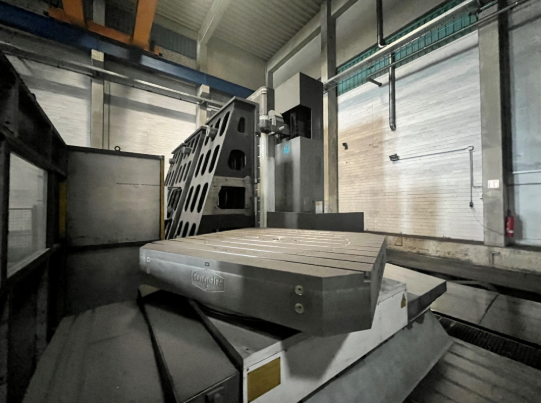 modern cnc machining center producing precision metal components in a professional manufacturing facility