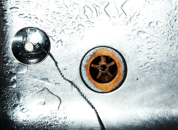 small rusted metal part during a gentle soak treatment