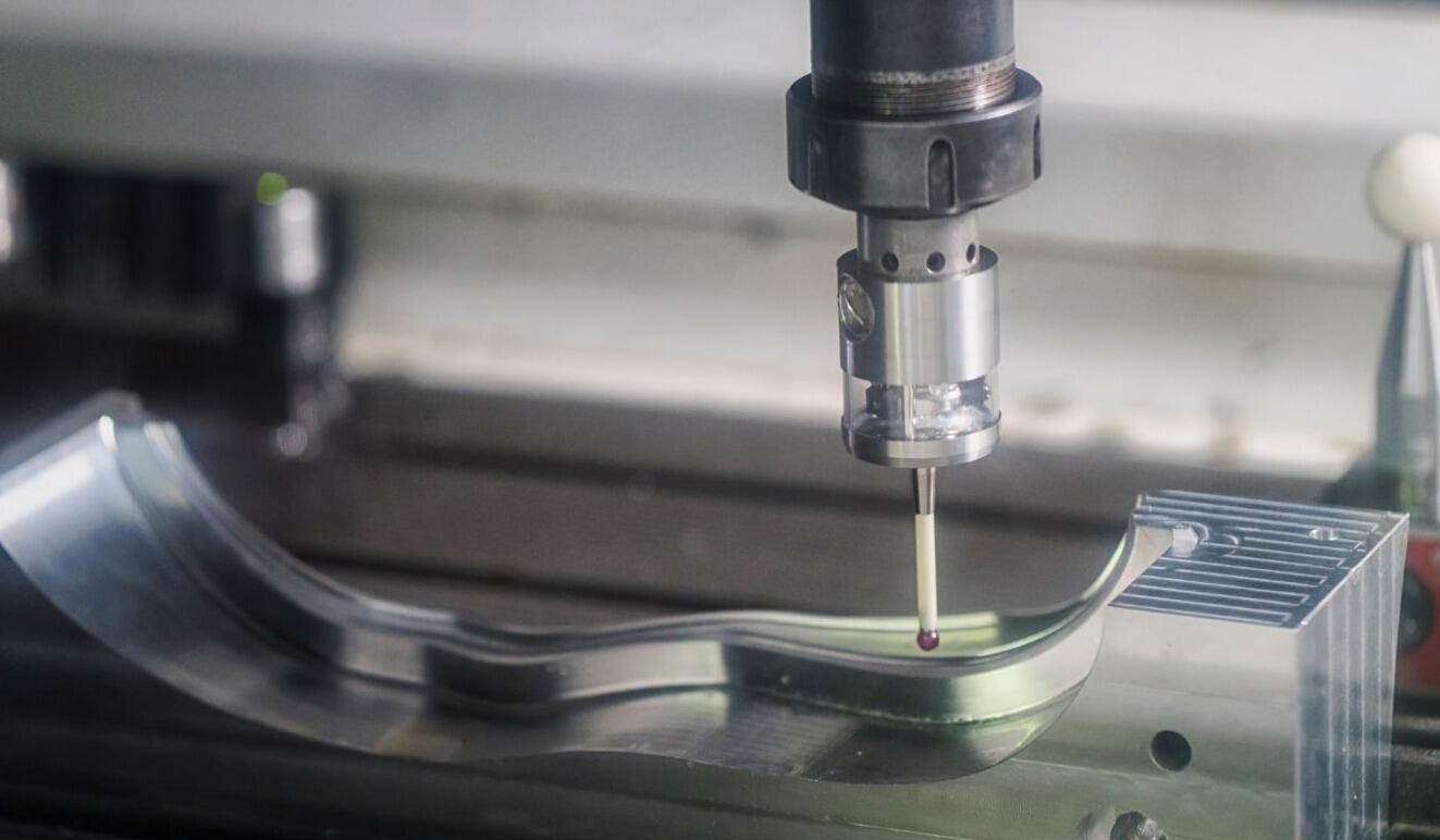 cnc milling machine producing precision metal parts in a modern manufacturing facility