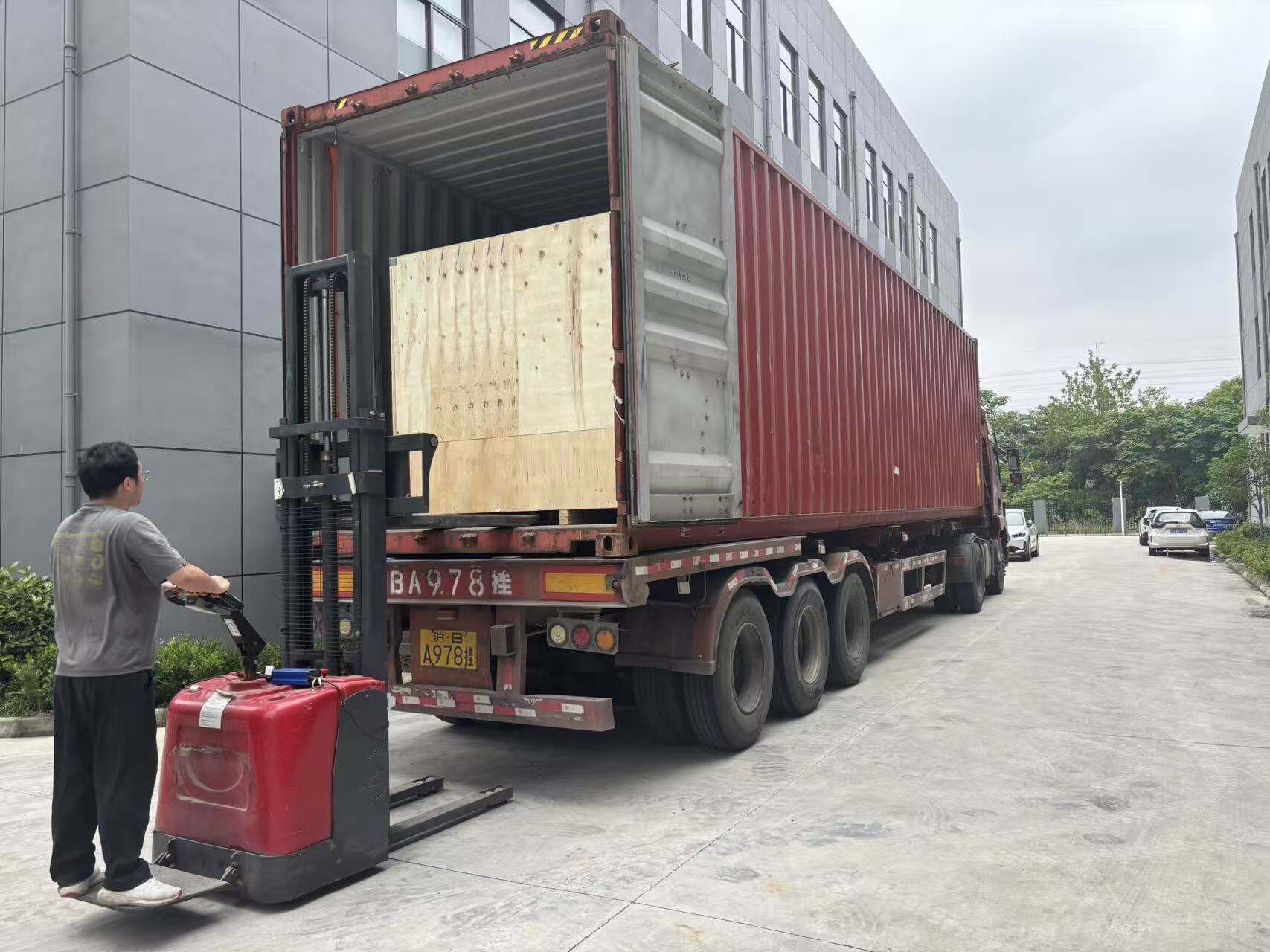 One 40HQ container loaded with a complete 2,000 BPH bottled water production line shipped to Tonga