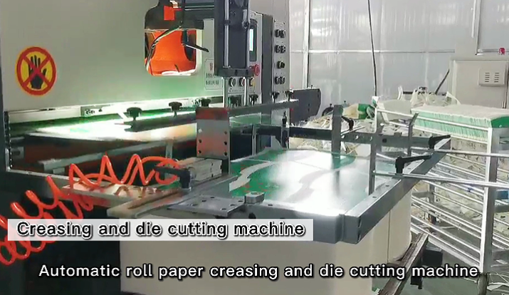 Creasing and die cutting machine