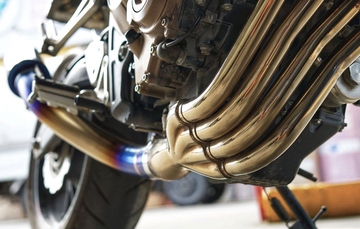 How to prepare Ti6Al4V titanium surfaces before applying protective coatings for enhanced adhesion?