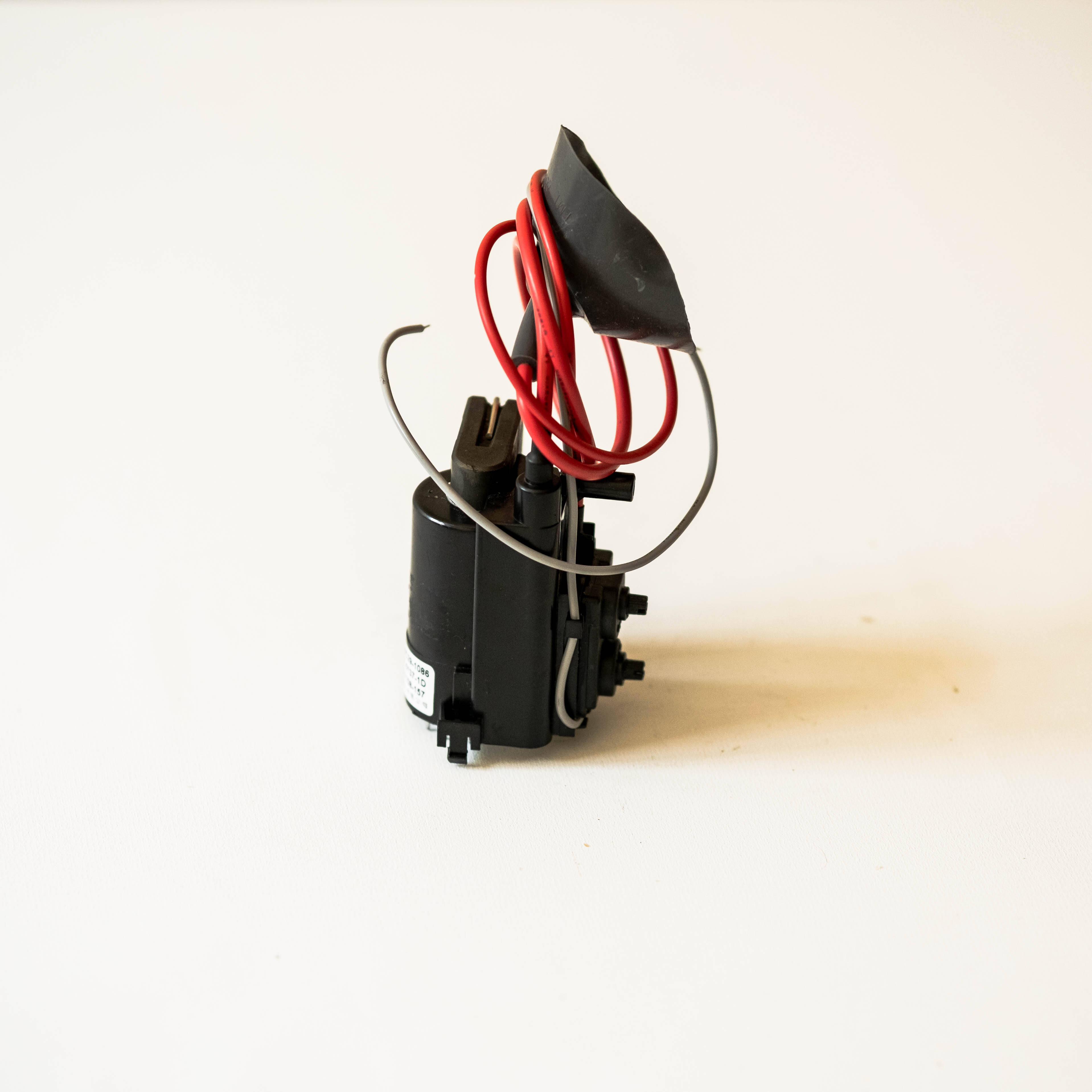 How does electrostatic spraying improve coating adhesion and durability