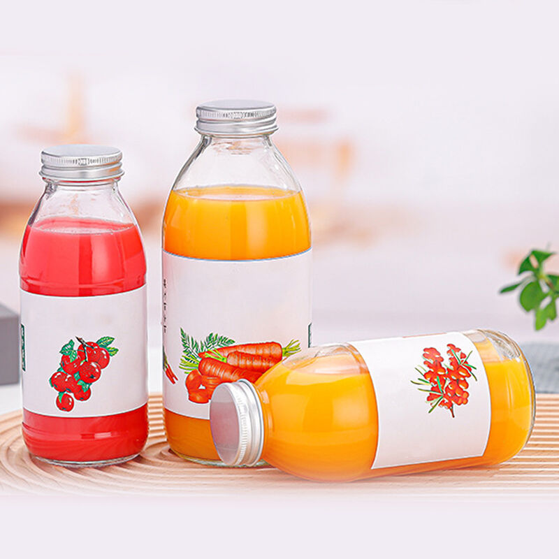 Botellas de vidrio premium para jugo con tapas para todas las marcas