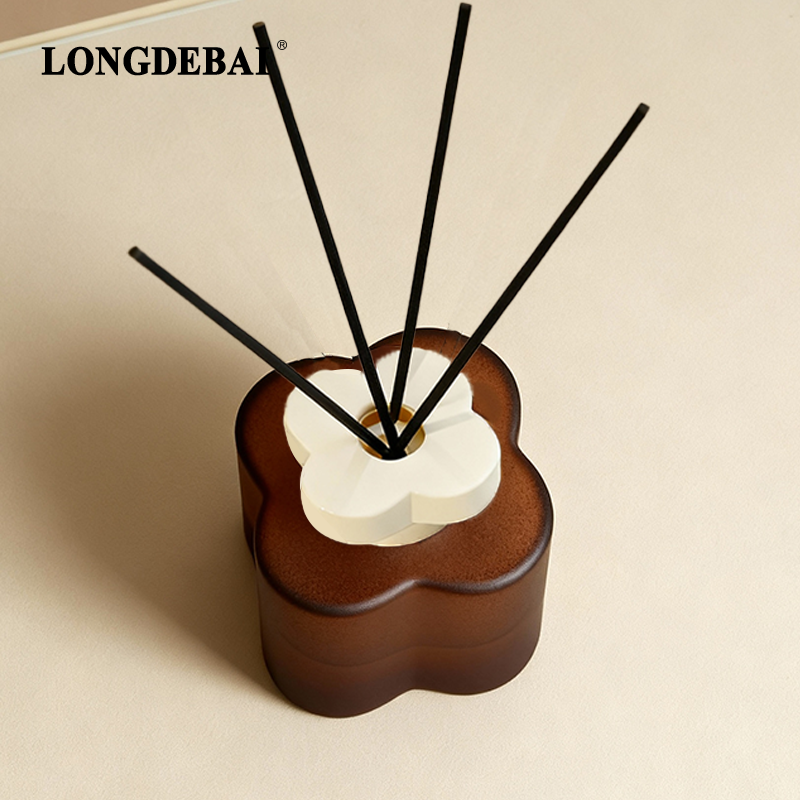 OEM customized petal-shaped glass reed diffuser bottle factory