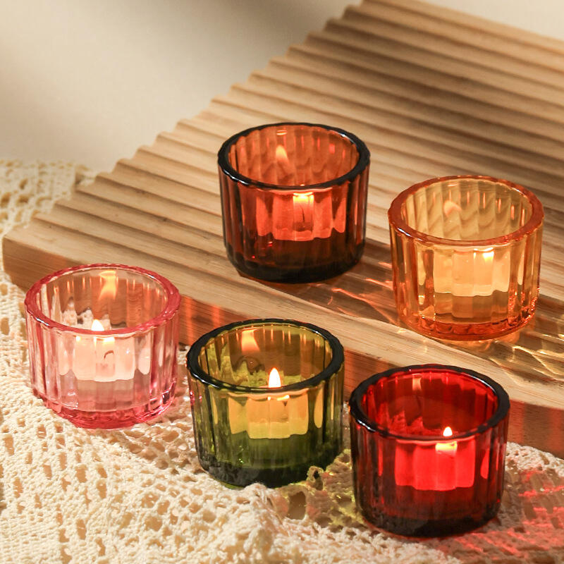 What designs make candle jars easy to replace candle wicks?