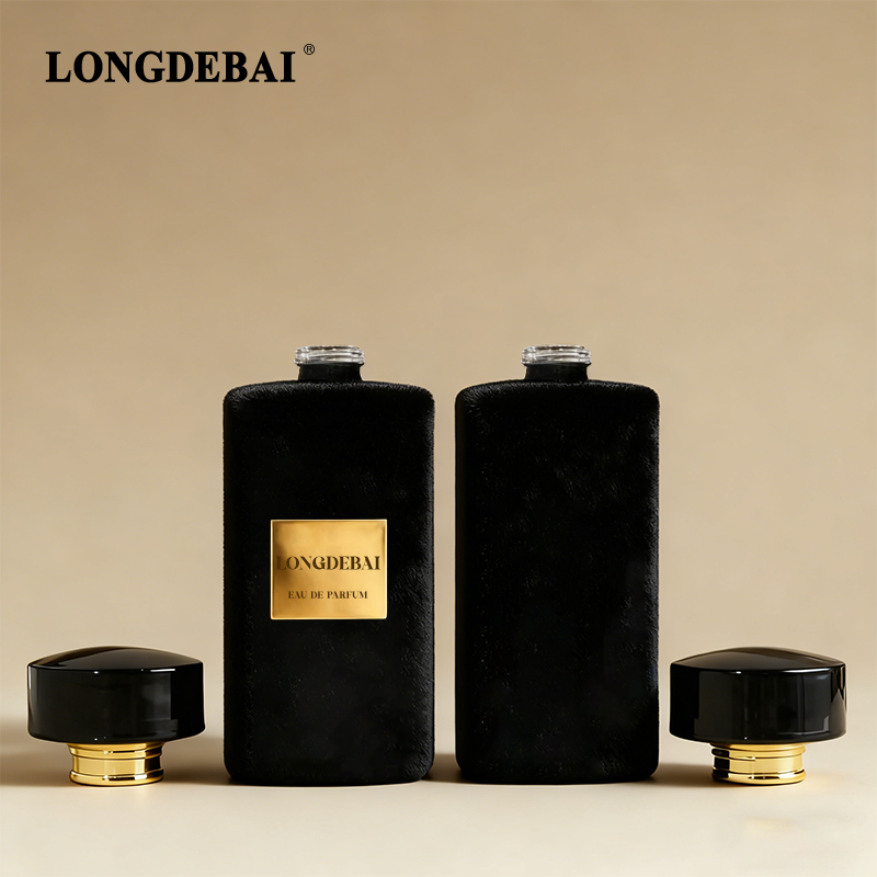 Cylindrical flocked glass perfume bottle with black gold bottle cap