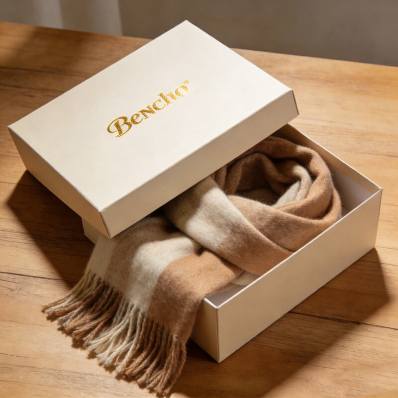 Premium white glossy finish clothing gift box with magnetic seal and ribbon for luxurious product presentation