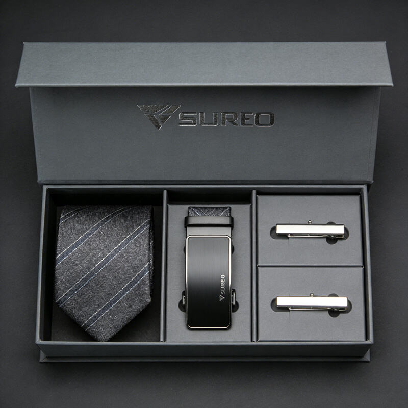 Elegant magnetic closure clothing packaging box with velvet finish and ribbon bow for luxury gift presentation