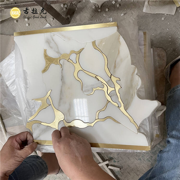 Luxury Calacatta Gold Marble Waterjet Mosaic Inlay Brass Design