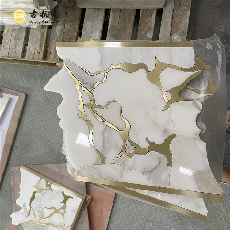 Luxury Calacatta Gold Marble Waterjet Mosaic Inlay Brass Design