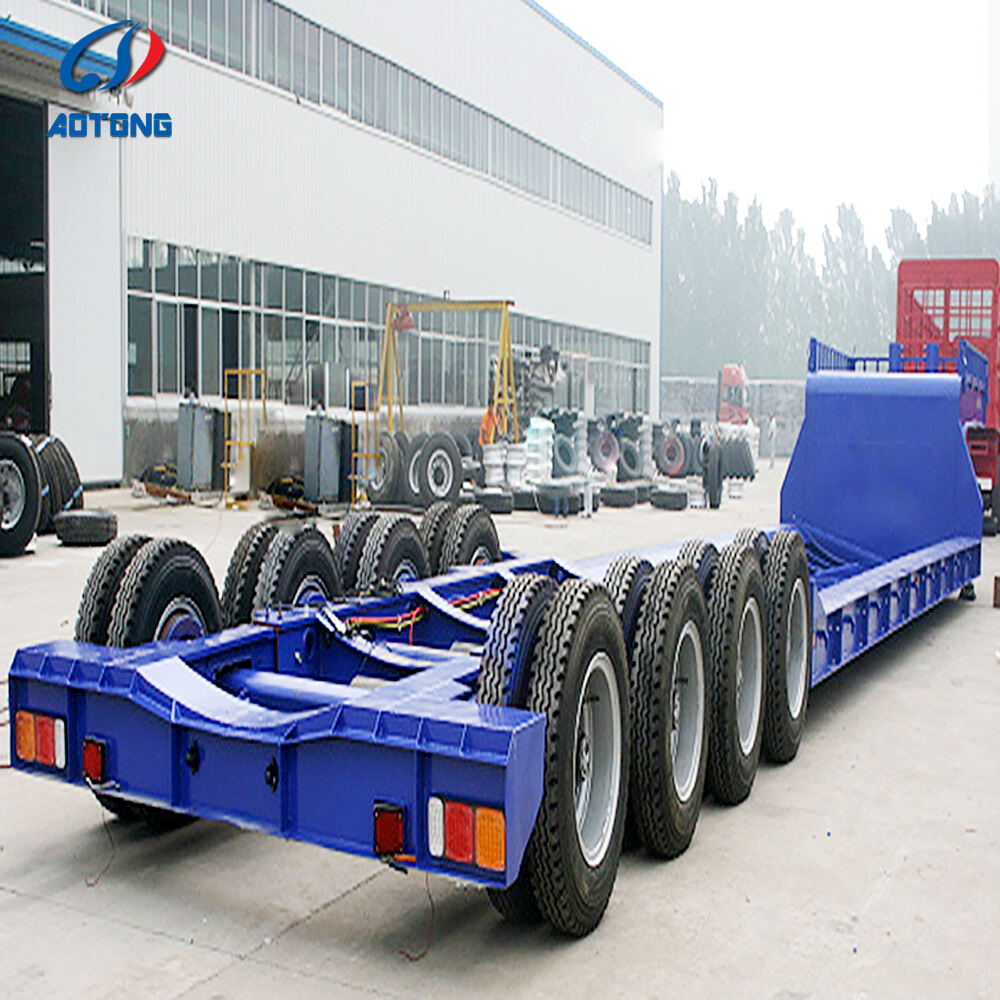Schaufelradschlepper für den Transport von Niedrigbetten