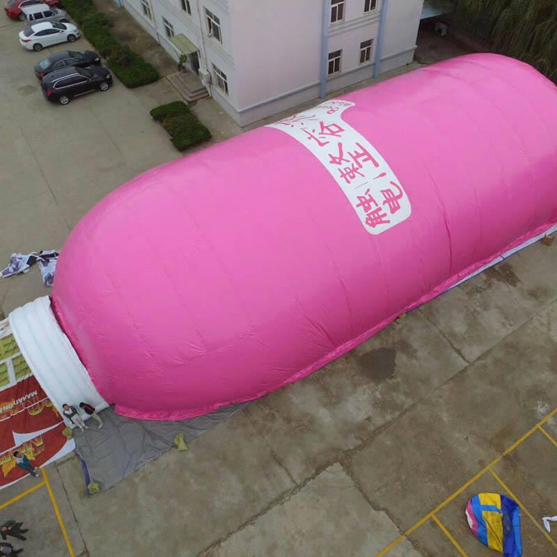 Tienda inflable gigante con forma de botella