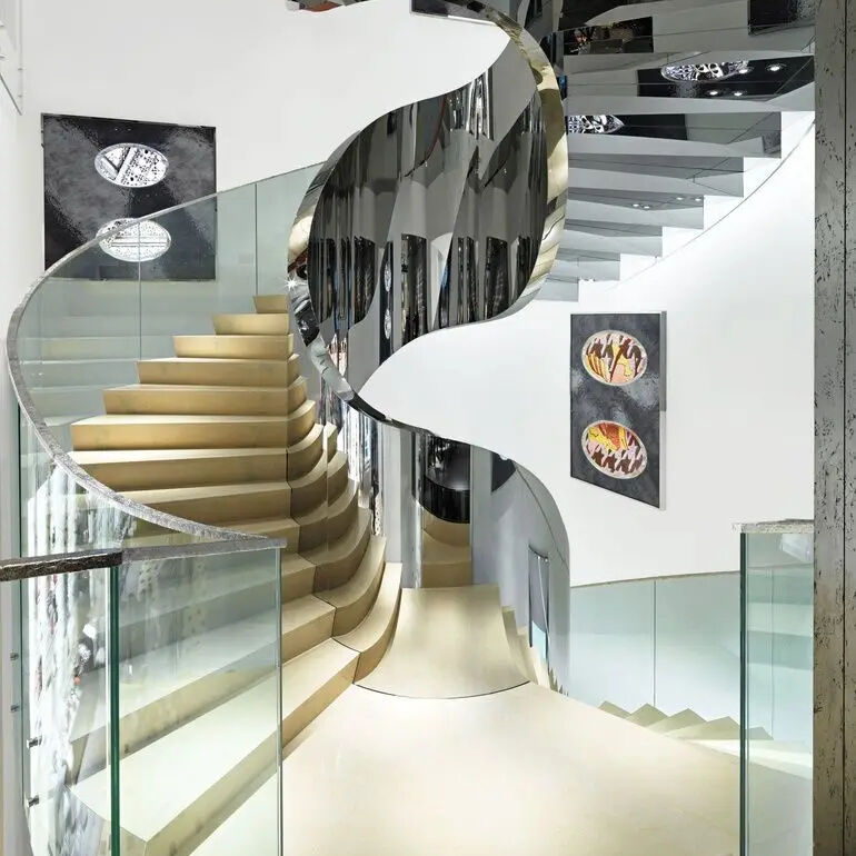 Spiral Elegance: The Aesthetic Appeal of Curved Stairs in Modern Architecture