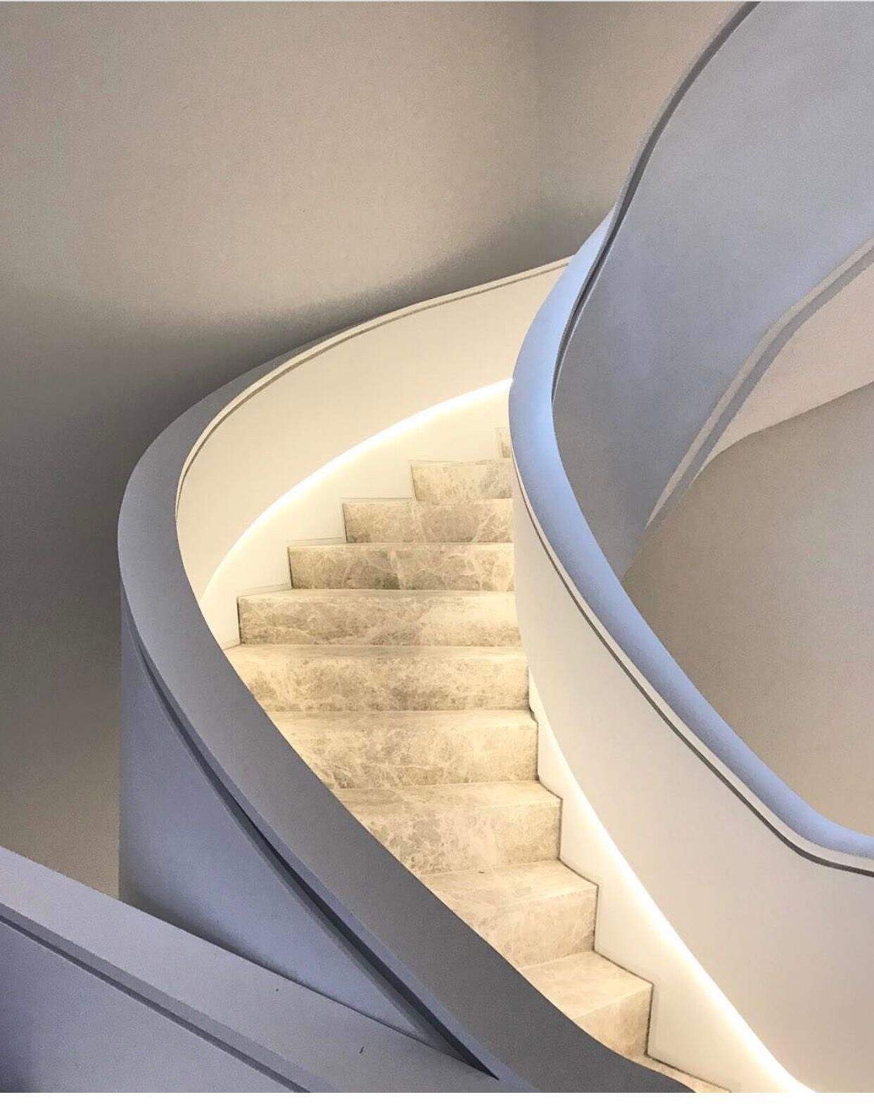 Luxury style curved double plate stringer marble stone tread floating spiral stairs with railings from Foshan factory supplier