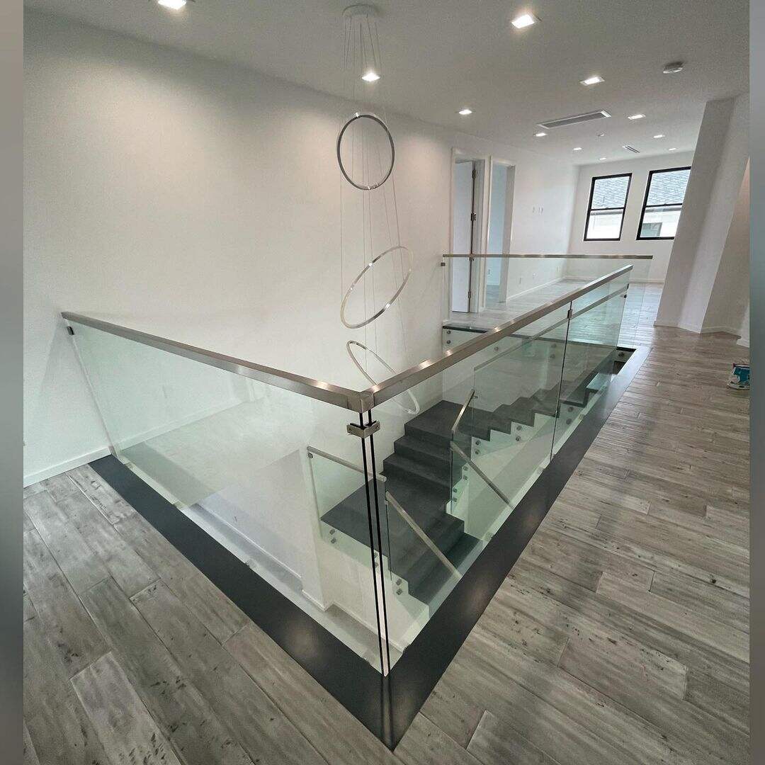 Home stair case balustrade S.S frameless stainless steel standoff glass railing indoor details