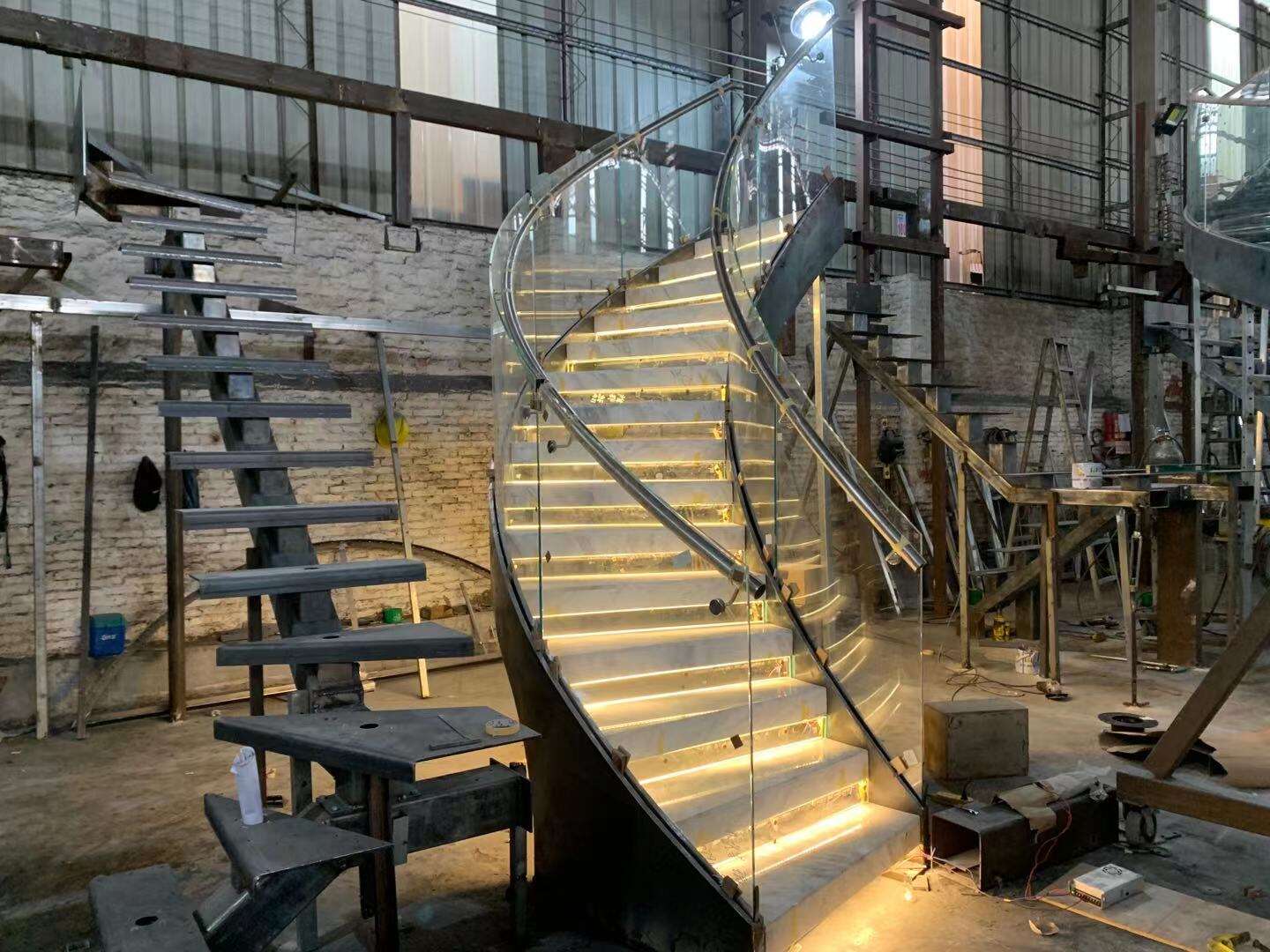 American standard luxury curved carbon steel stringer wood/marble open tread floating spiral stairs with glass railing handrail factory