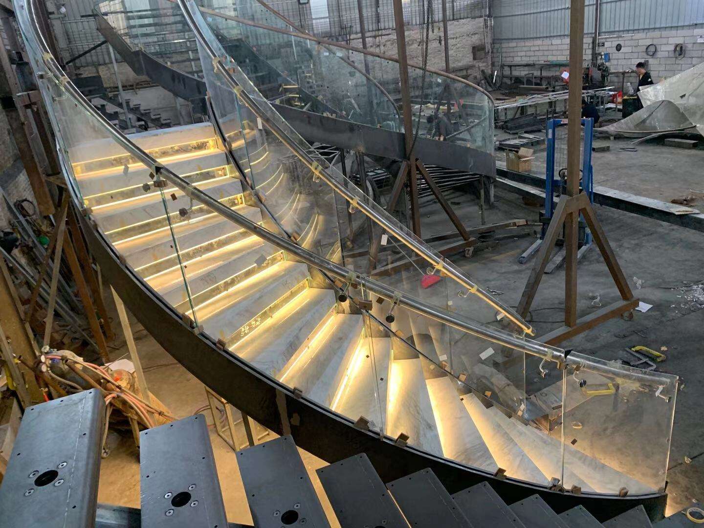 American standard luxury curved carbon steel stringer wood/marble open tread floating spiral stairs with glass railing handrail factory