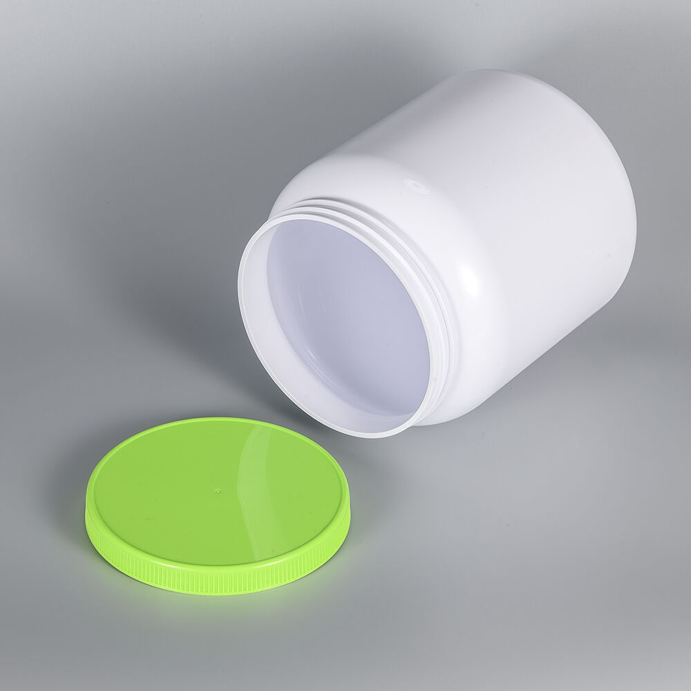 ZLS – individuální plastová potravinářská lahve z HDPE o objemu 1 litr pro balení proteinového prášku v nádobě se šroubovacím uzávěrem