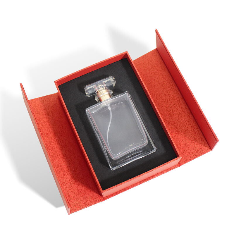 Scatola per profumi arancione con doppia anta e inserto in EVA